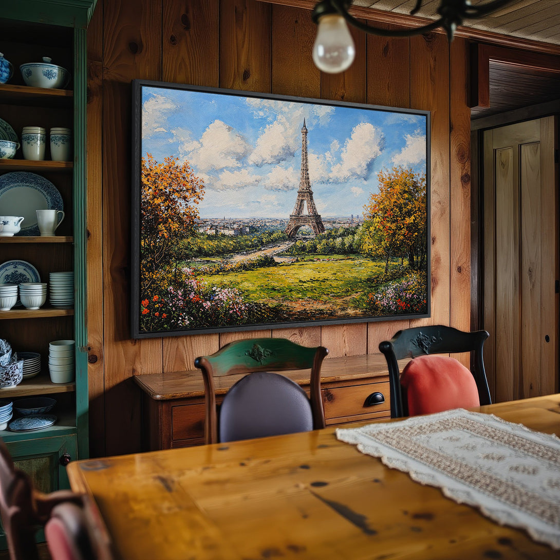 Framed Wall Art: Eiffel Tower canvas print in a cozy dining room. Impressionist style, featuring blue sky, green grass, and autumn colors.