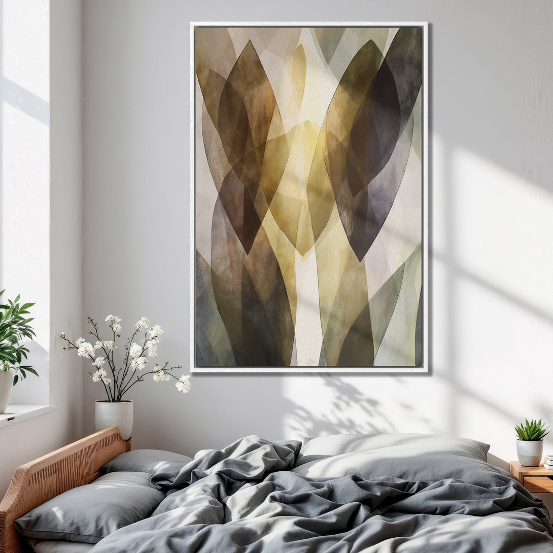 Framed Wall Art featuring an abstract leaf design in muted earth tones. Modern art for your bedroom decor. Enhance your space with this canvas print!