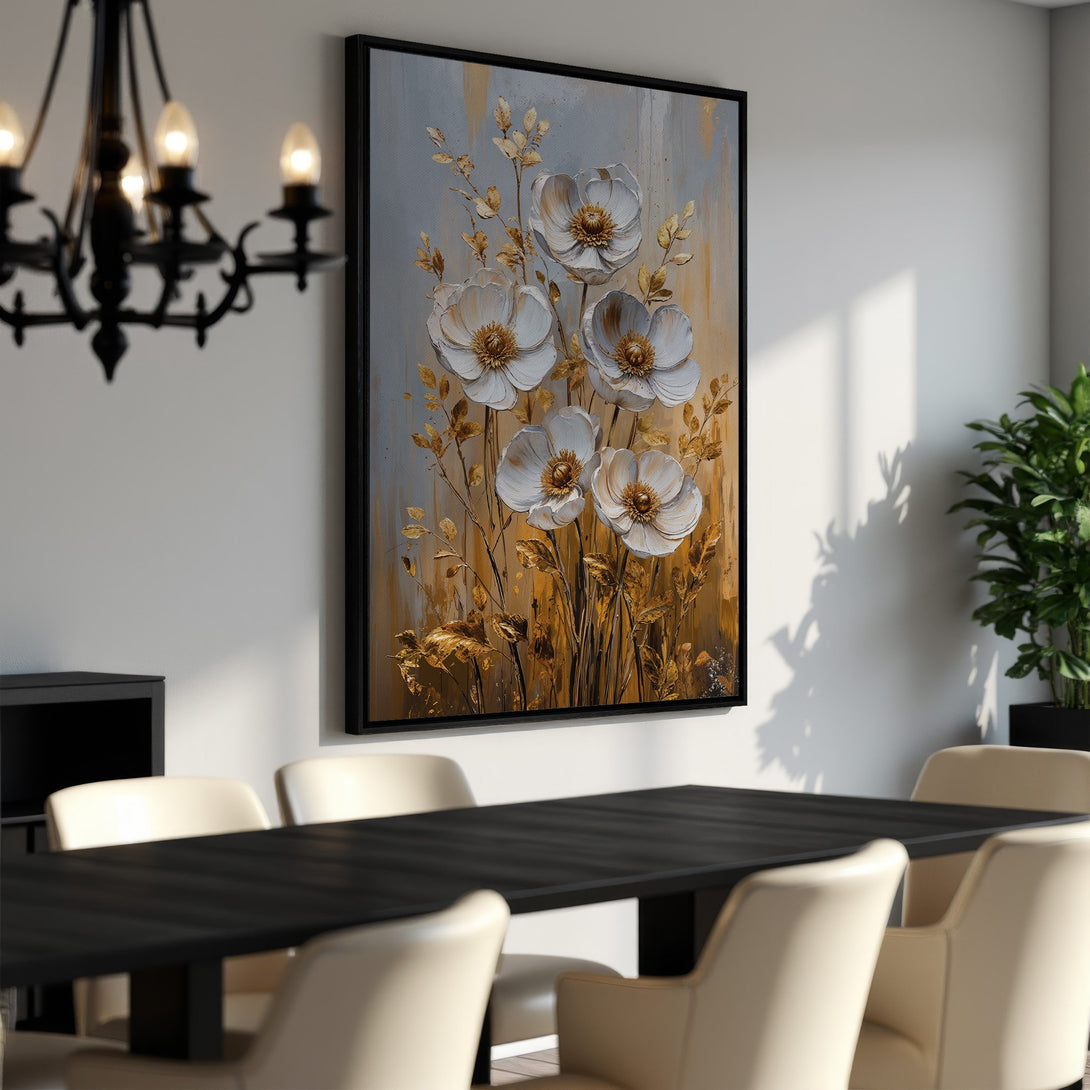 Framed Wall Art featuring elegant white floral painting with gold accents. Modern decor in a dining room setting. Neutral color palette.