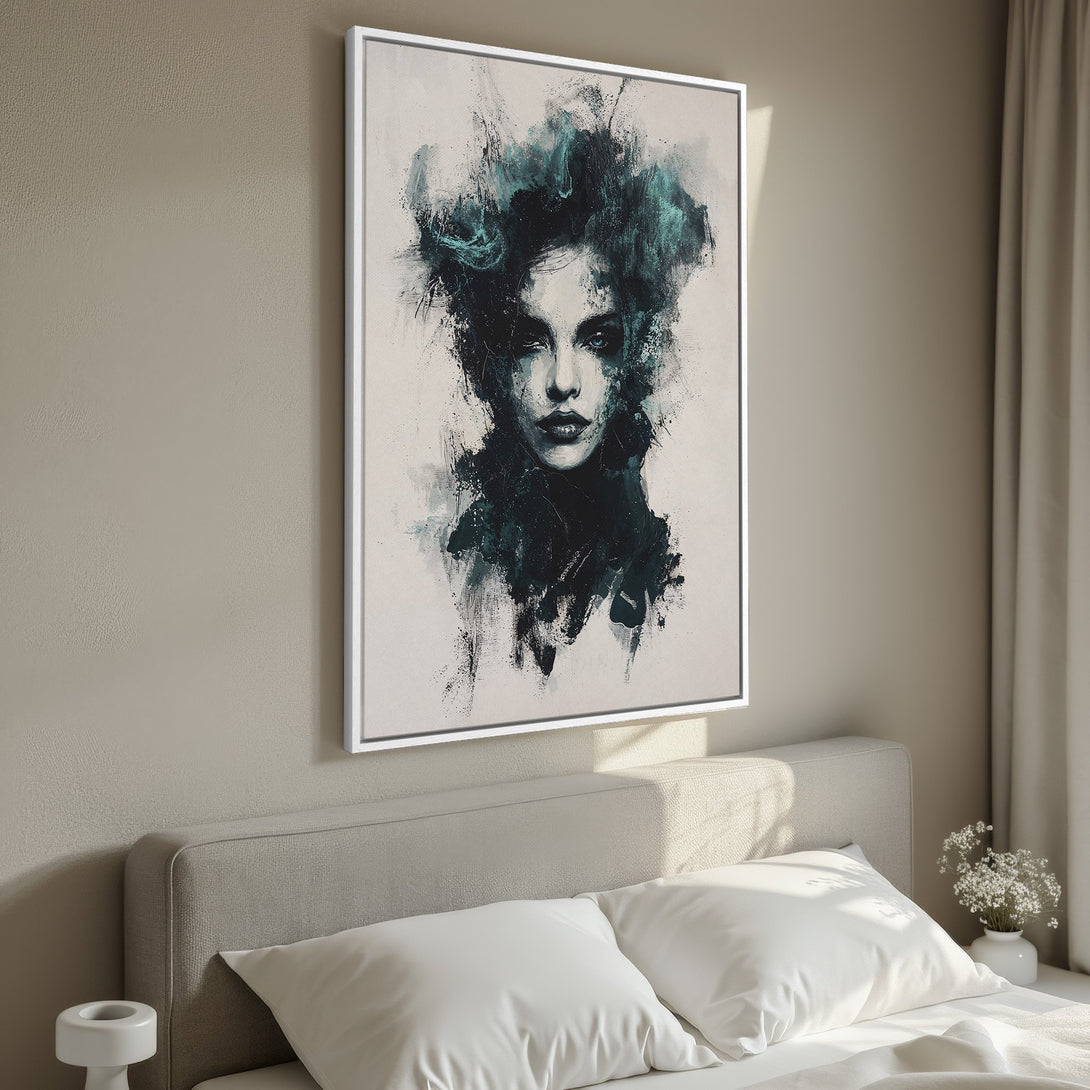 Framed Wall Art featuring an abstract portrait in teal and black. Modern, expressive style. Perfect for bedroom decor.