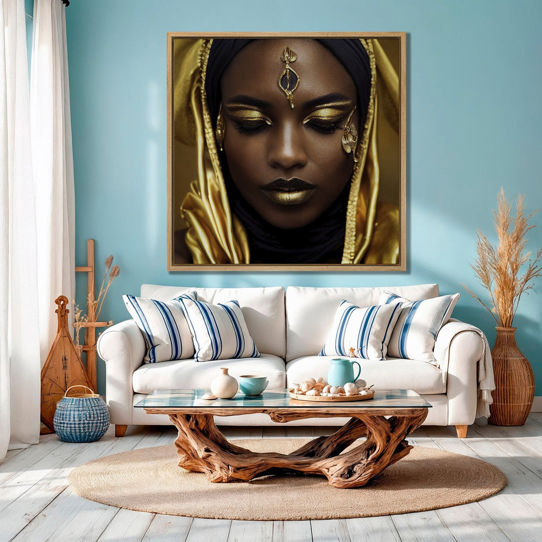 Framed Wall Art featuring a woman with gold makeup, displayed in a stylish interior. Stunning gold and black portrait against a turquoise wall, adding elegance to any space.