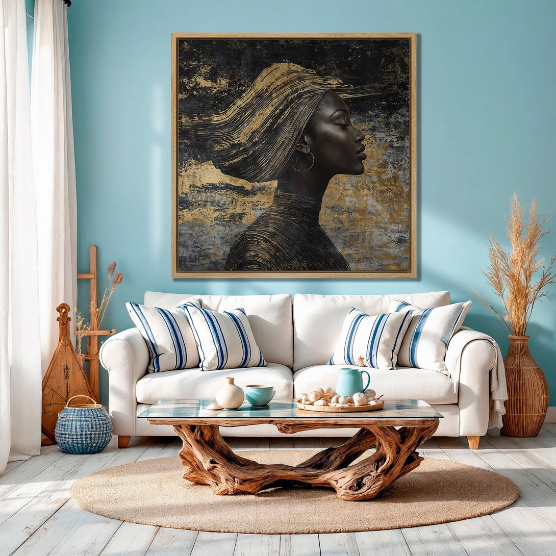 Framed Wall Art featuring an elegant woman in gold and black, displayed in a stylish living room.  Modern art with a calming blue and neutral color palette.