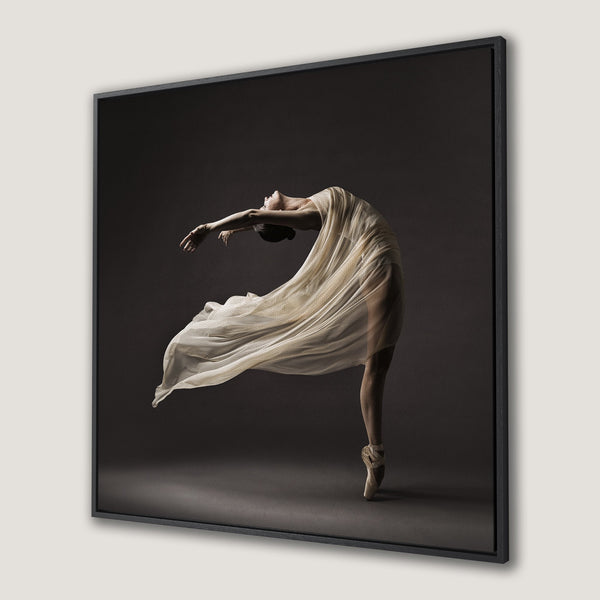 Framed Wall Art: Elegant ballerina in flowing fabric, neutral color palette. Perfect for adding a touch of grace to any space. Shop now!