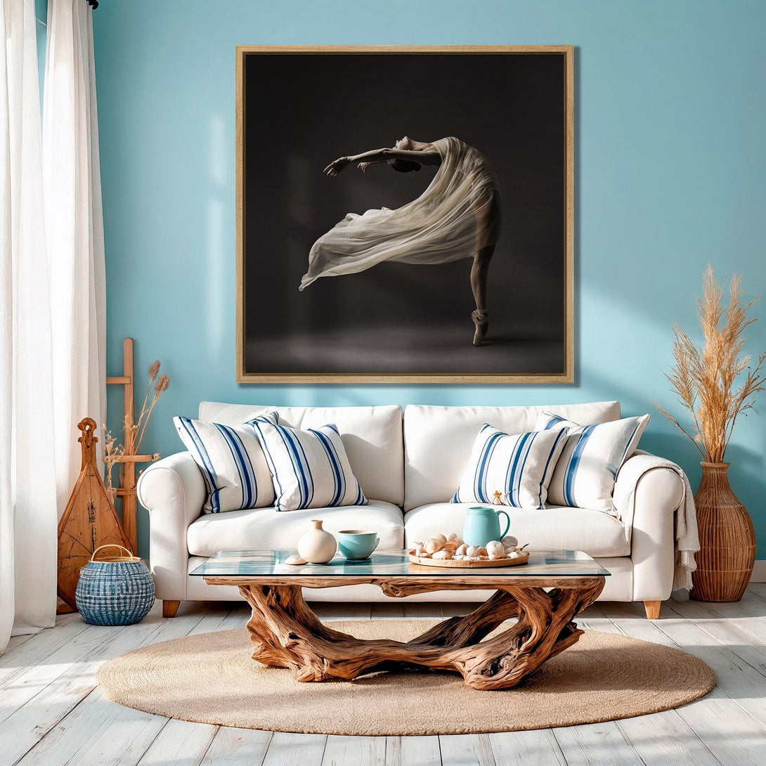 Framed Wall Art: Elegant ballet dancer canvas print in neutral tones. Perfect for adding a touch of art to any space. Coastal-inspired decor with blue accents.