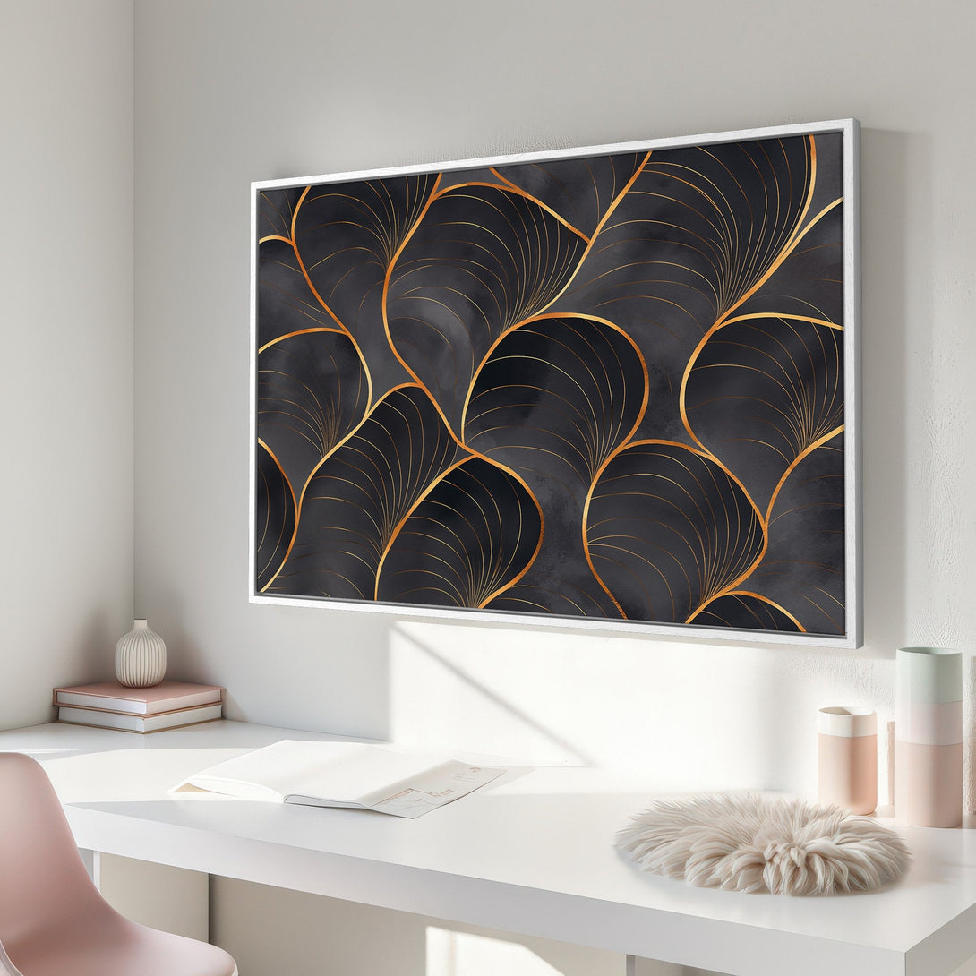 Framed Wall Art: Abstract gold leaf design on a dark gray canvas. Modern art for home decor with a luxurious, elegant feel.