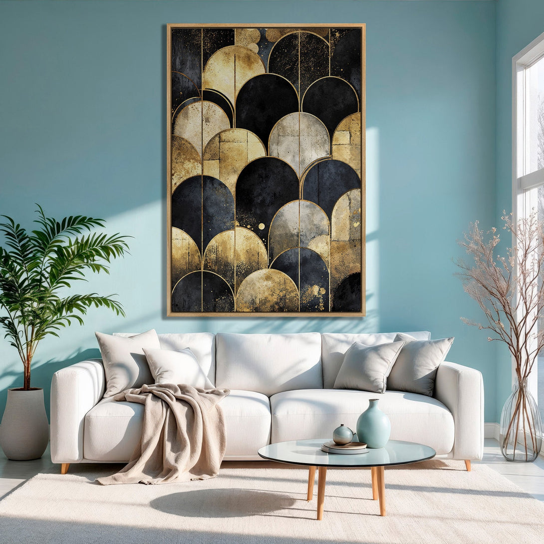 Framed Wall Art featuring an abstract geometric design in black, gold, and neutral tones. Modern art for home decor, shown in a living room setting.