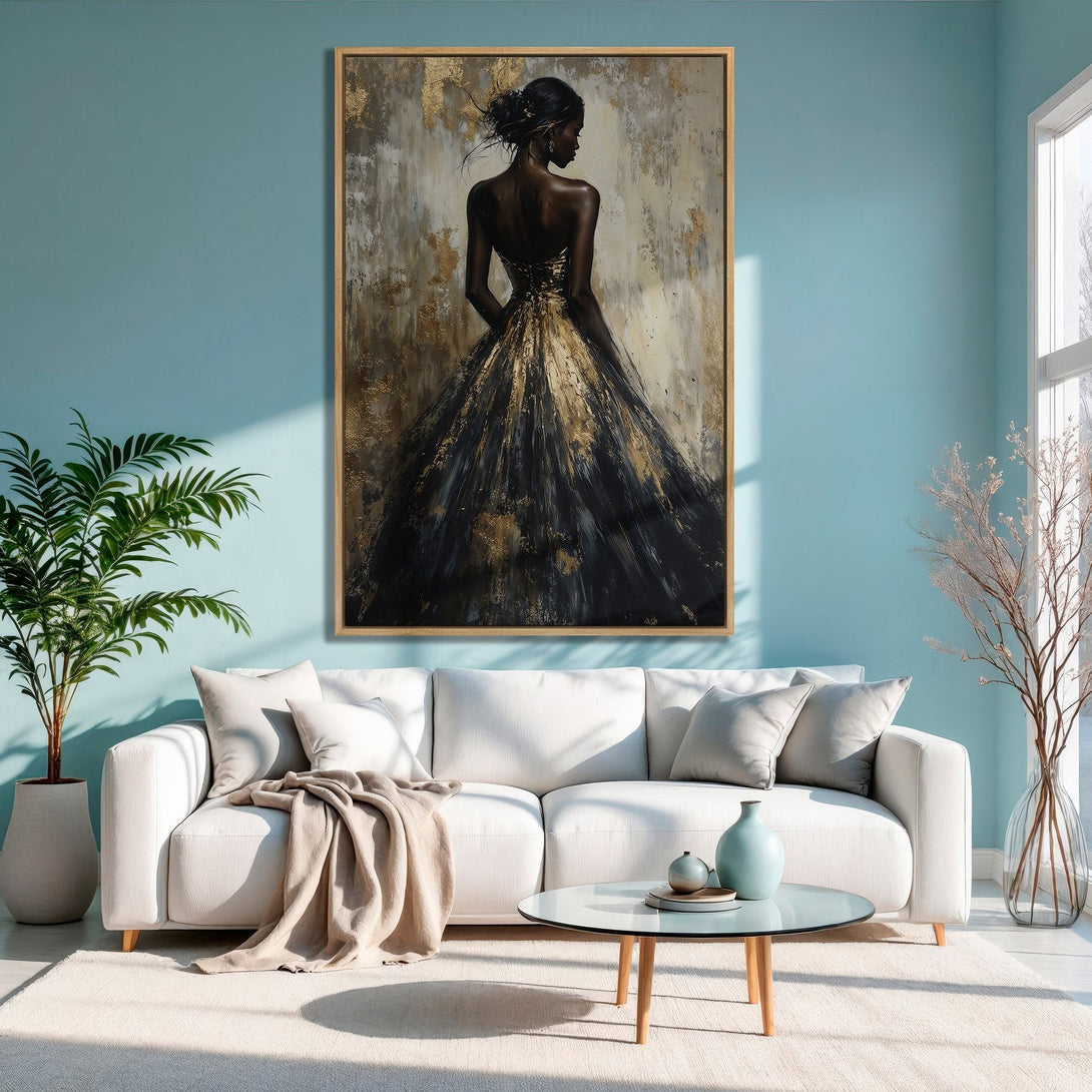 Framed Wall Art: Elegant woman in a gold and black dress. Abstract style, neutral and gold tones. Perfect for adding a touch of luxury.