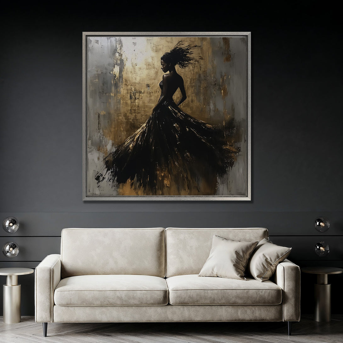 Framed Wall Art: Abstract silhouette of a woman in a flowing black dress. Gold and gray tones create a dramatic, modern canvas print for your home.