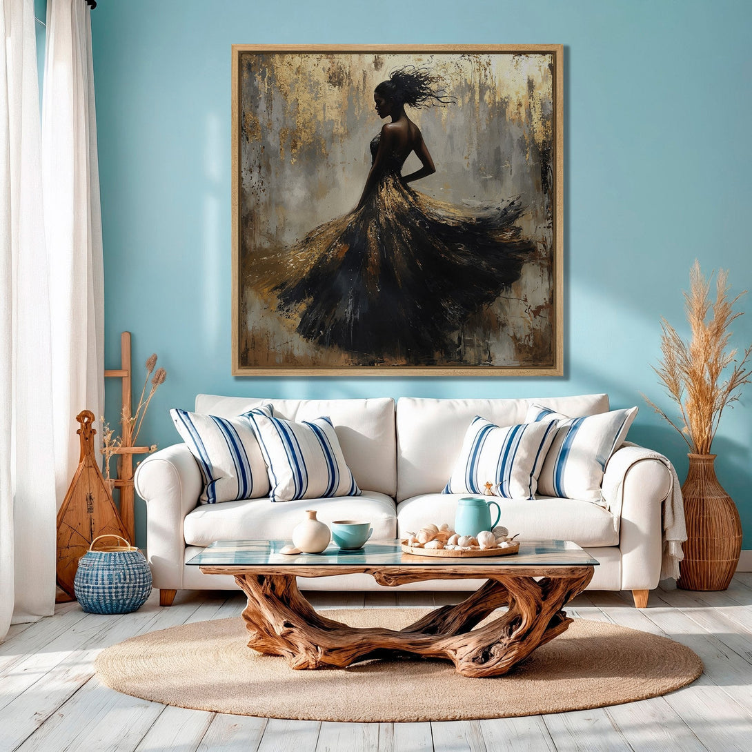 Framed Wall Art featuring an elegant woman in a flowing black and gold dress. Abstract style with a neutral and gold color palette, perfect for any interior.