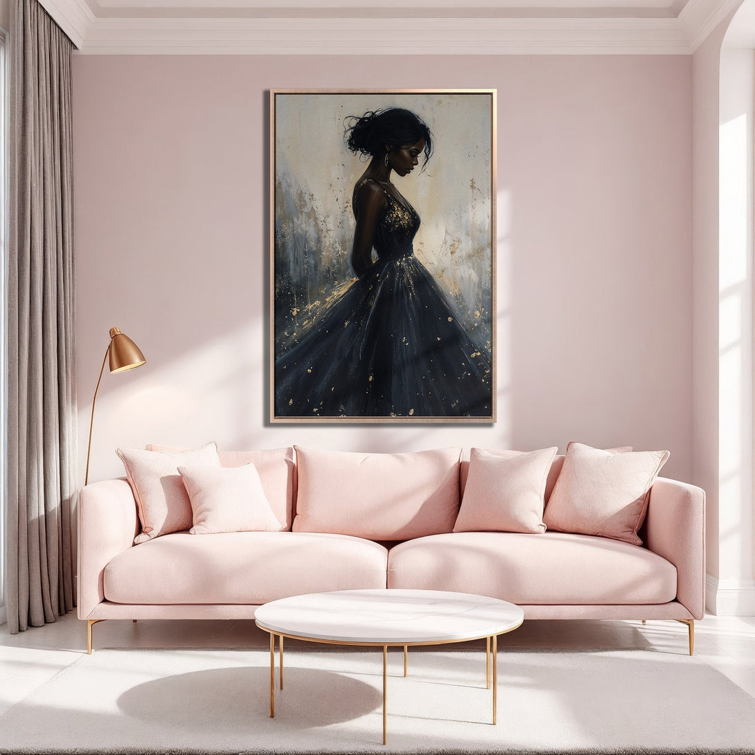 Framed Wall Art: Elegant black dress portrait with gold accents, displayed in a stylish interior. Soft pink and gold color palette for a touch of luxury.