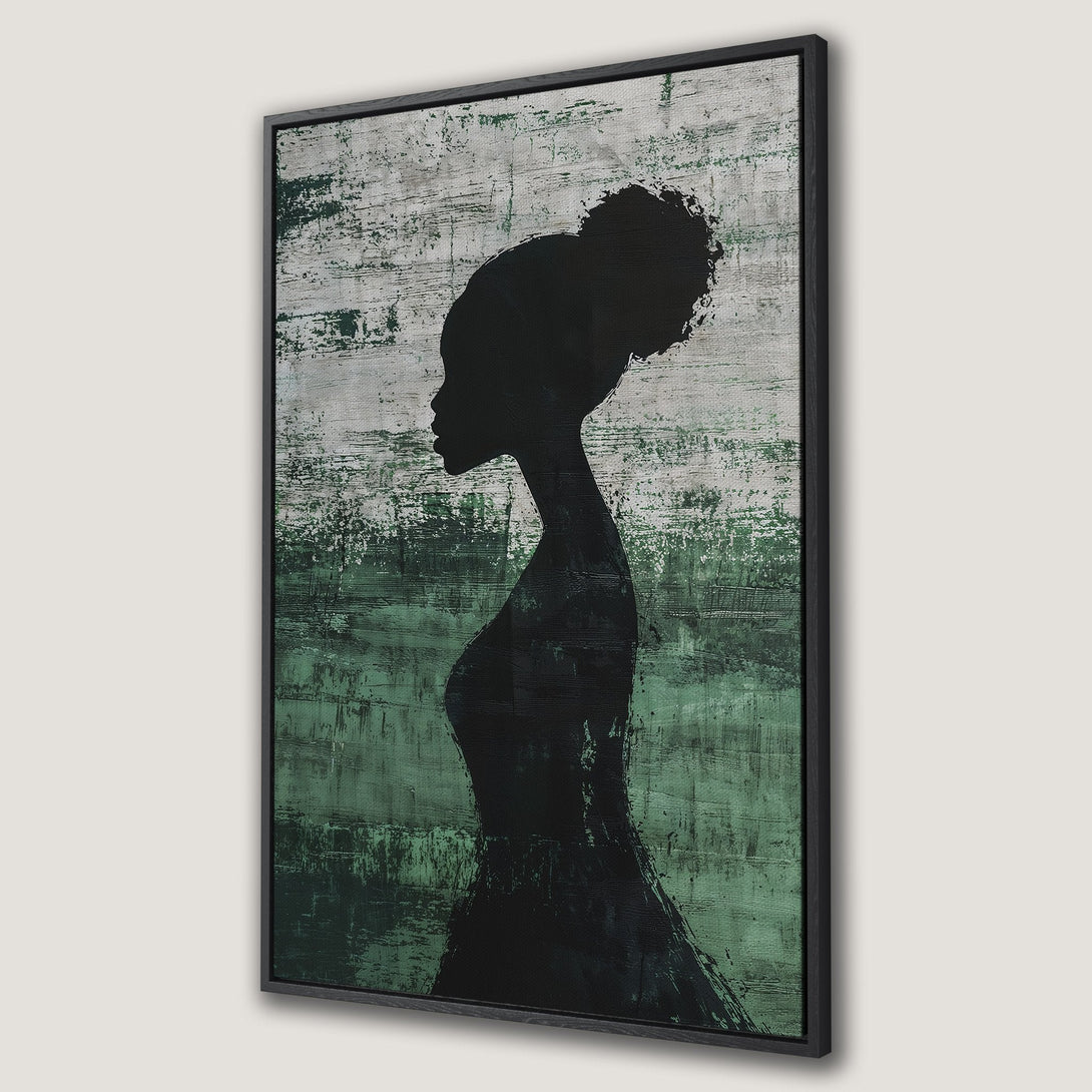 Framed Wall Art featuring a silhouette of a woman against a textured green and gray background. Modern, abstract art for your home decor.