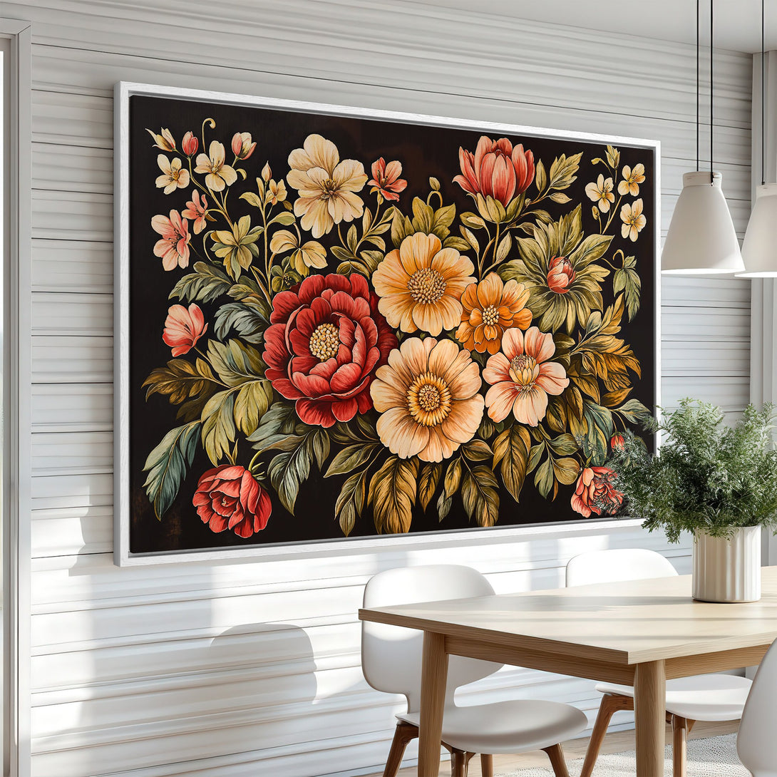 Framed Wall Art featuring a vibrant floral bouquet in warm red, orange, and yellow tones against a dark background. Adds elegance to any interior.