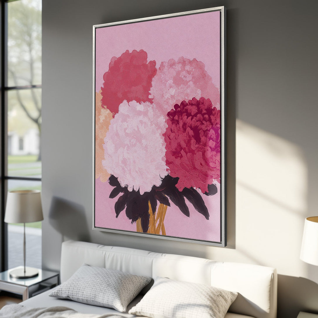 Framed Wall Art featuring abstract floral art in pink and red hues. Modern style Canvas Print adds a pop of color to any interior.