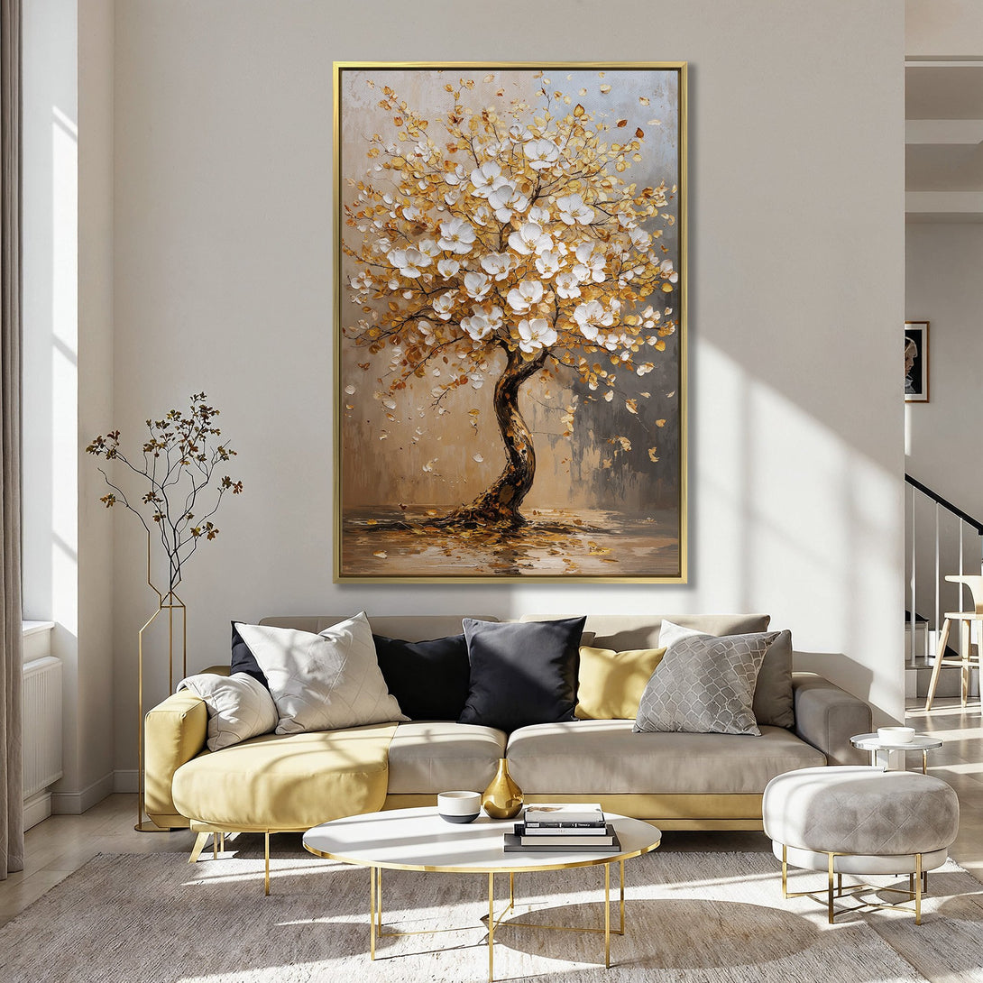 Canvas Print of a blossoming tree in warm gold and white tones, displayed in a cozy interior with a pink wall. Perfect wall art for any space.