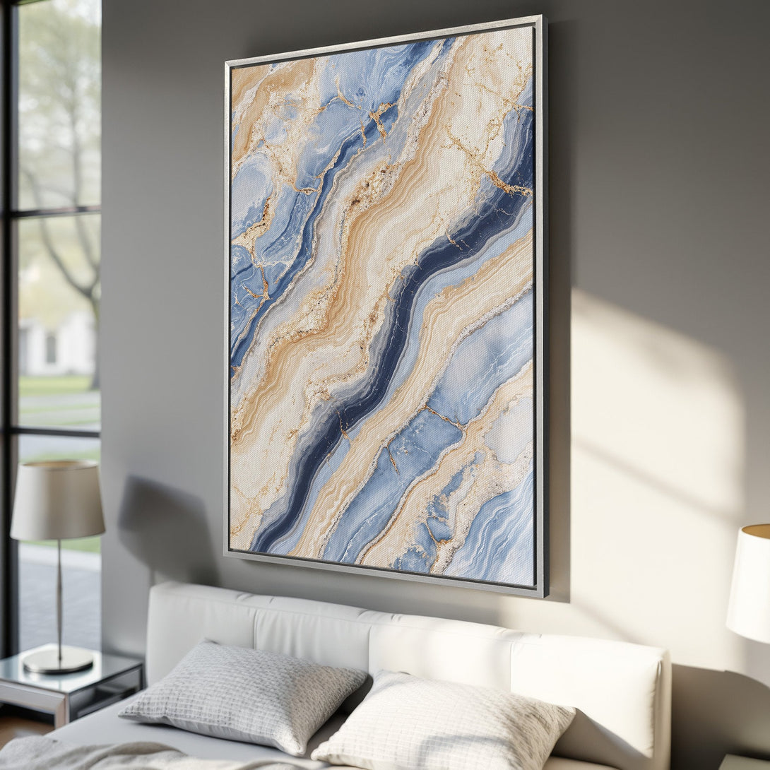 Framed Wall Art featuring a modern abstract design with blue, gold, and beige tones, adding a touch of elegance to any interior space.