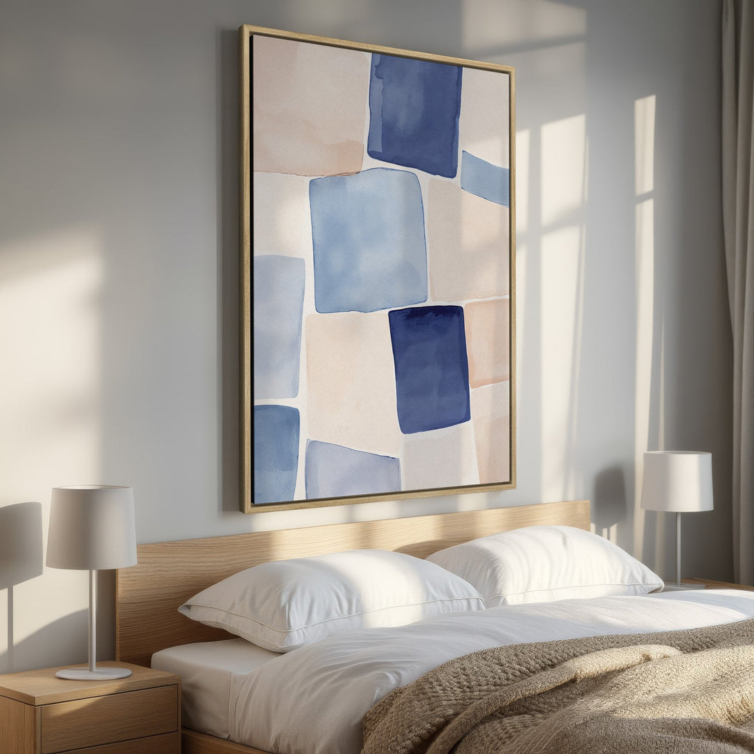 Framed Wall Art: Abstract watercolor canvas print in a bedroom. Features a calming palette of blue, beige, and white. Modern, stylish home decor.