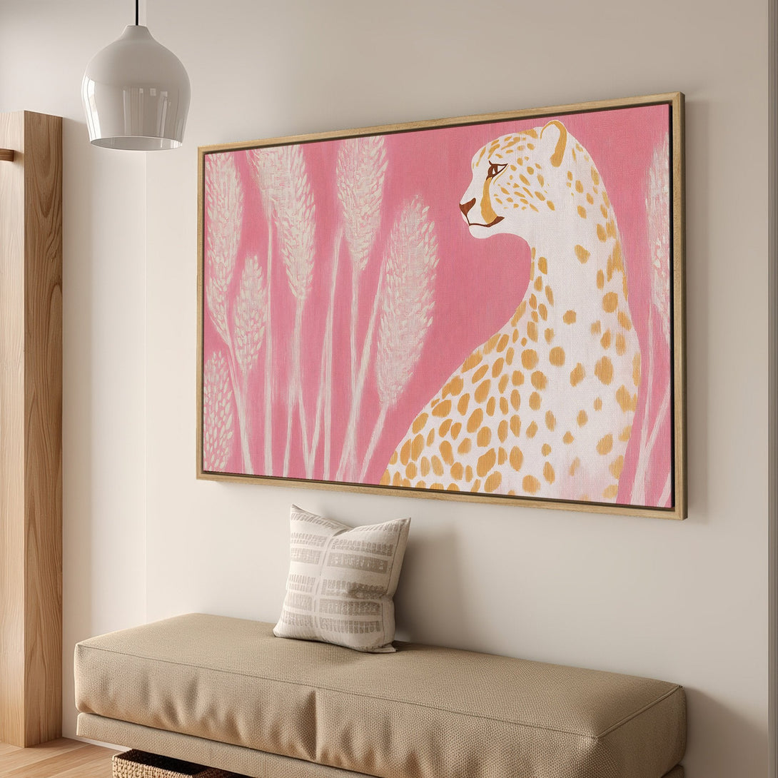 Framed Wall Art featuring a cheetah in a modern, pink and gold palette. Add a touch of elegance to your space with this stylish canvas print.