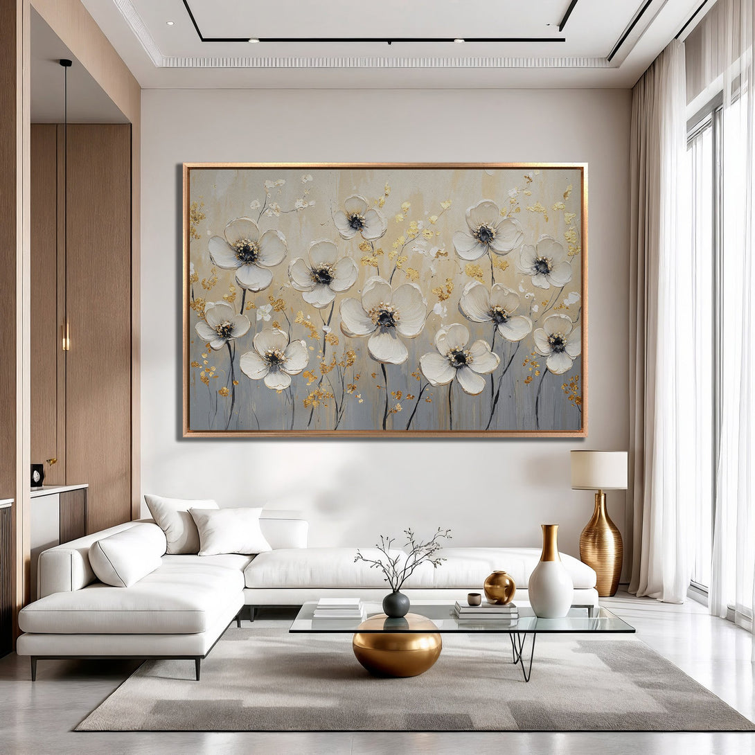 Framed Wall Art: Elegant white floral painting with gold accents. Modern style, neutral color palette. Perfect for living room decor.