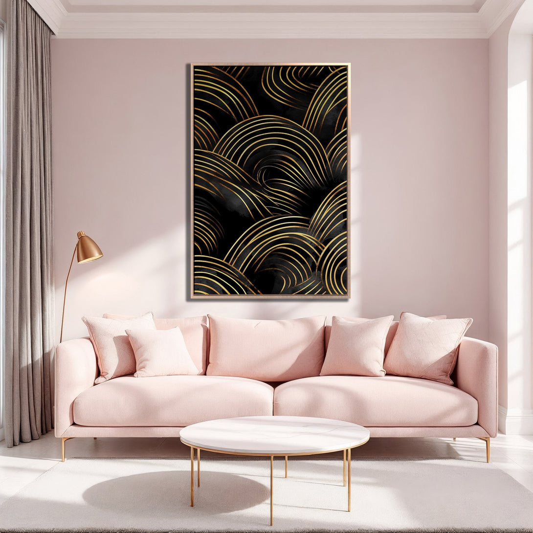 Framed Wall Art: Abstract gold lines on black canvas. Modern art in a blush pink living room. Luxurious decor with gold accents.