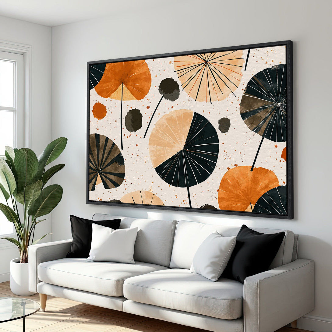 Framed Wall Art featuring an abstract geometric design in a warm orange, black, and beige color palette. Modern art perfect for living room decor.