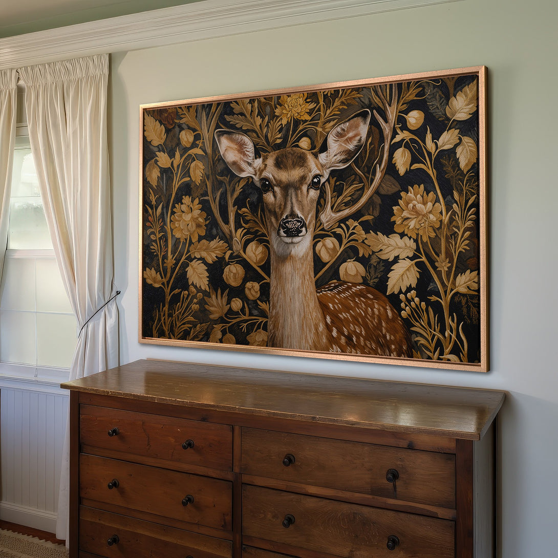 Framed Wall Art featuring a majestic deer in a floral tapestry design. Earthy tones of brown, gold, and black create a warm, elegant aesthetic.