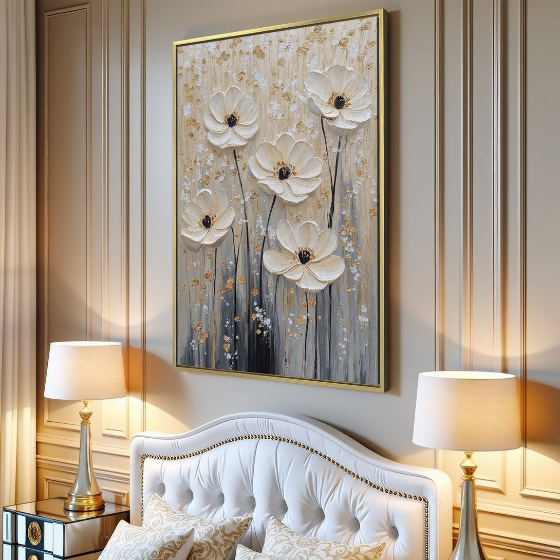Canvas Print featuring textured white flower art with gold accents, displayed in a modern living room. Neutral color palette.