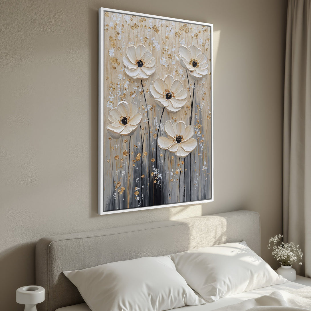 Framed Wall Art featuring textured white flowers with gold accents. Neutral color palette perfect for bedroom decor. Add elegance with this beautiful Canvas Print.