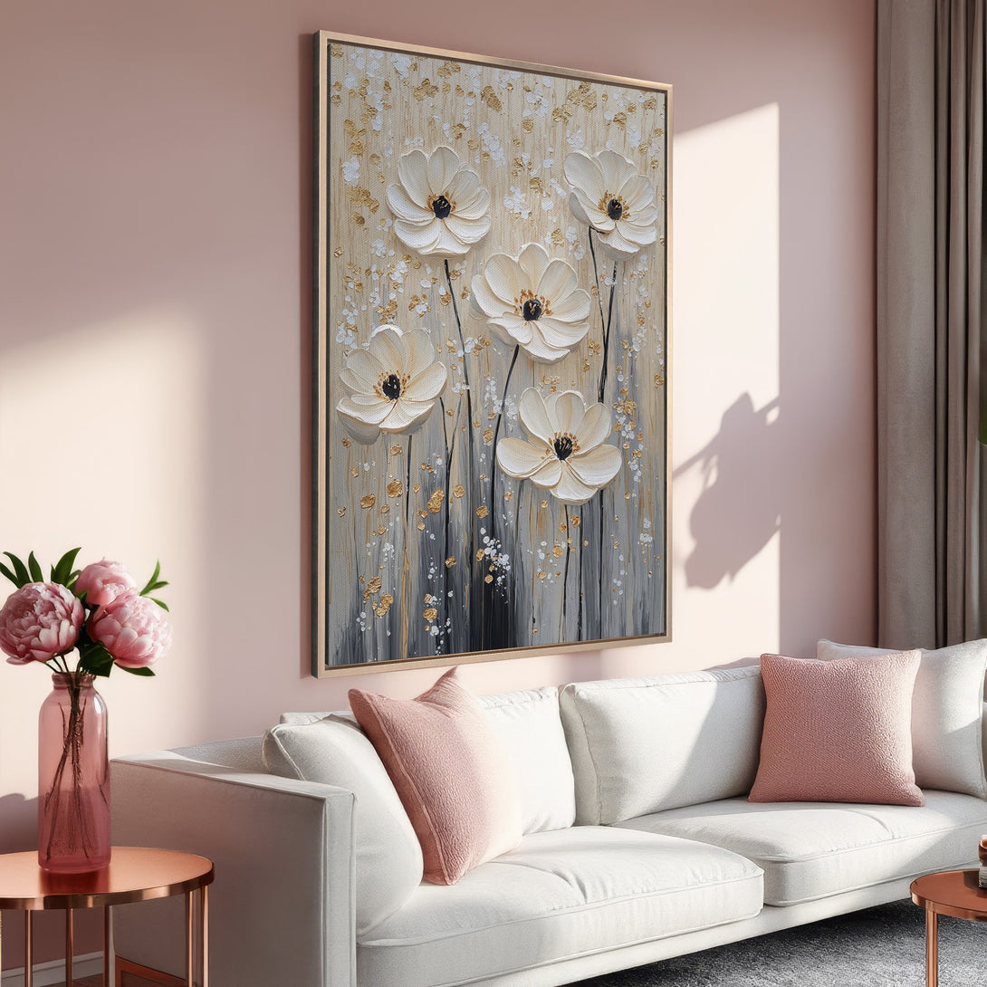 Framed Wall Art featuring elegant white flower painting with gold accents. Soft pink and neutral color palette, perfect for adding a touch of sophistication to any space.