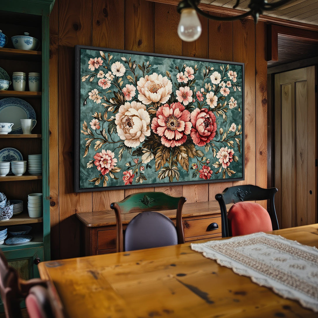 Framed Wall Art: Floral Canvas Print in a rustic dining room. Features a teal background with pink and cream flowers. Adds charm and warmth to any space.
