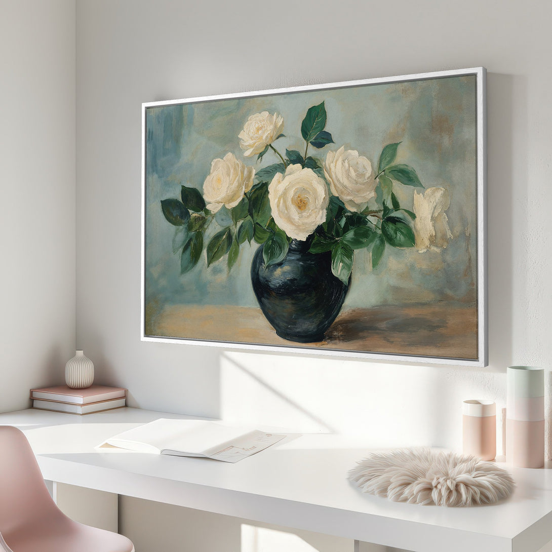 Framed Wall Art featuring a floral still life with white roses in a dark vase, displayed in a modern interior with a soft, muted color palette.