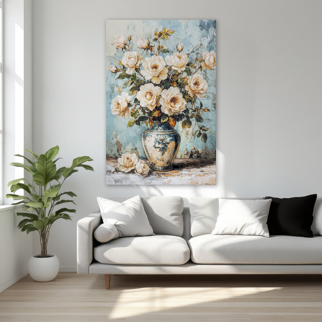 Framed Wall Art featuring a floral still life in a vintage style with a soft blue and cream color palette, perfect for adding elegance to your home.