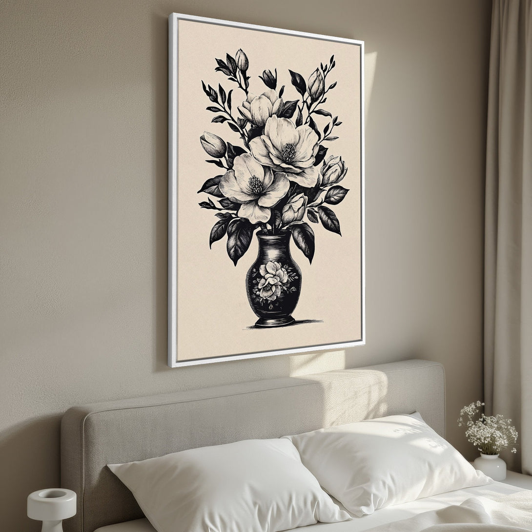 Framed Wall Art featuring a black and white floral illustration in a vase. Perfect for adding a touch of elegance to any bedroom. Neutral color palette.