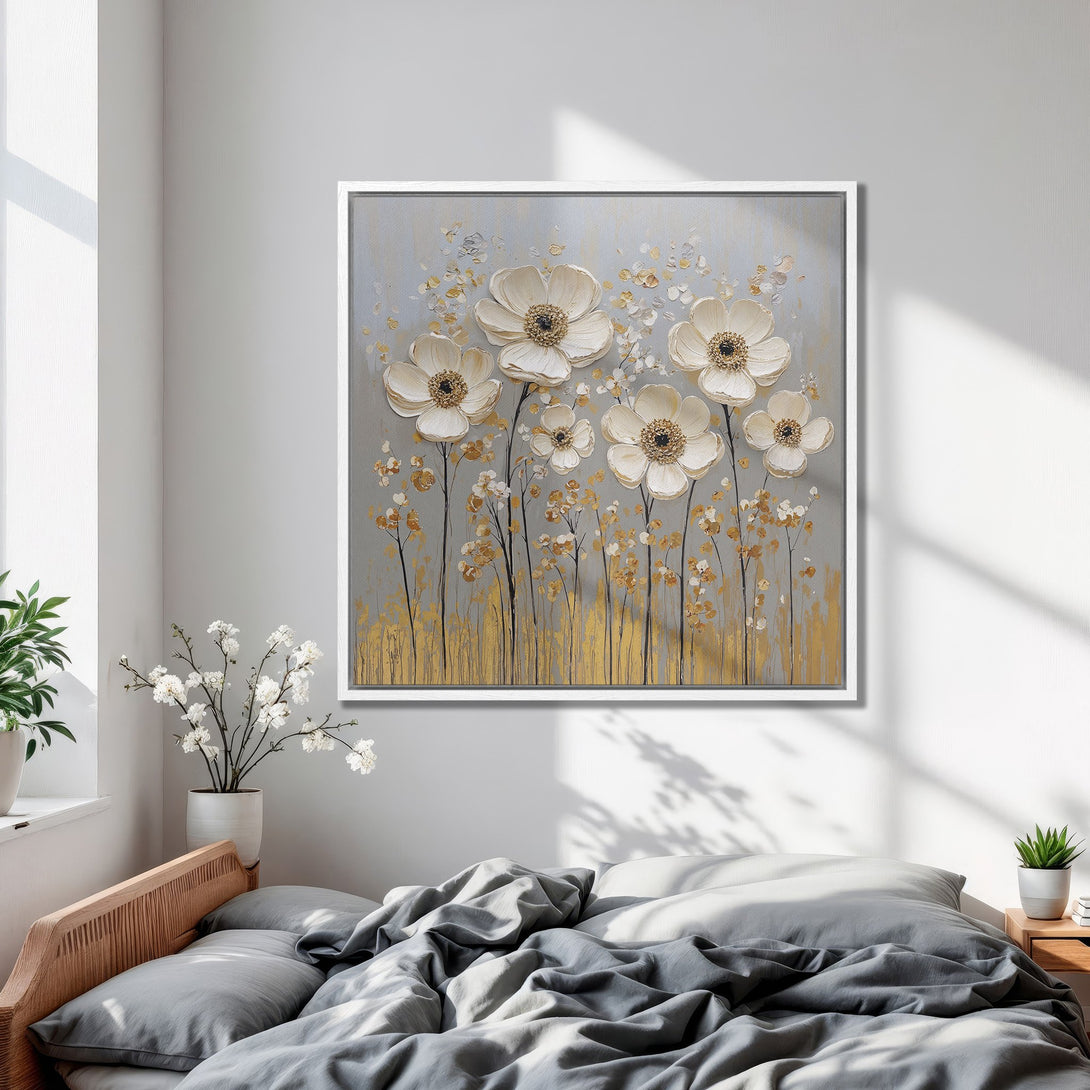 Framed Wall Art: Elegant floral canvas print in neutral tones. Features white flowers with gold accents, perfect for bedroom decor. Modern art for a serene space.