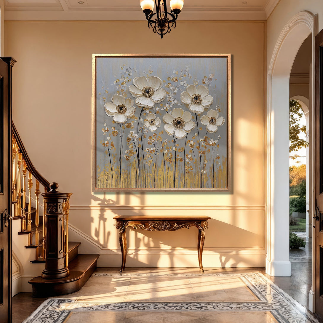 Framed Wall Art featuring elegant white floral art with gold accents, displayed in a luxurious interior. Soft, neutral color palette for a touch of sophistication.