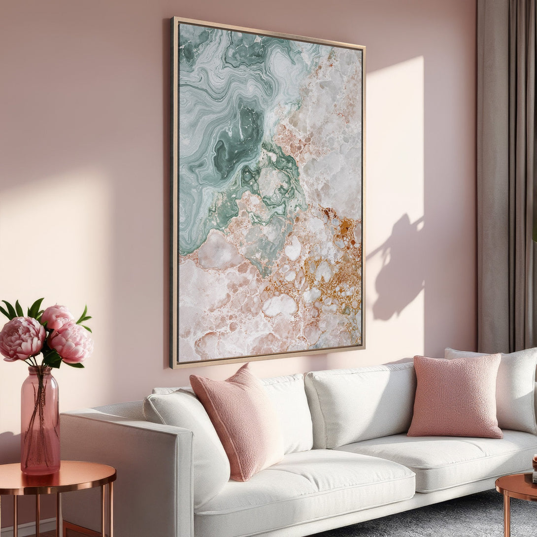 Framed Wall Art: Abstract marble design in green, pink, and gold. Modern canvas print adds elegance to a living room with a soft, neutral color palette.
