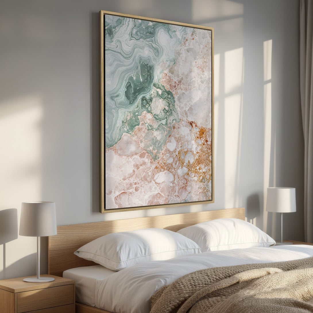 Framed Wall Art featuring an abstract marble design in green, pink, and gold tones, adding a touch of elegance to a bedroom interior.
