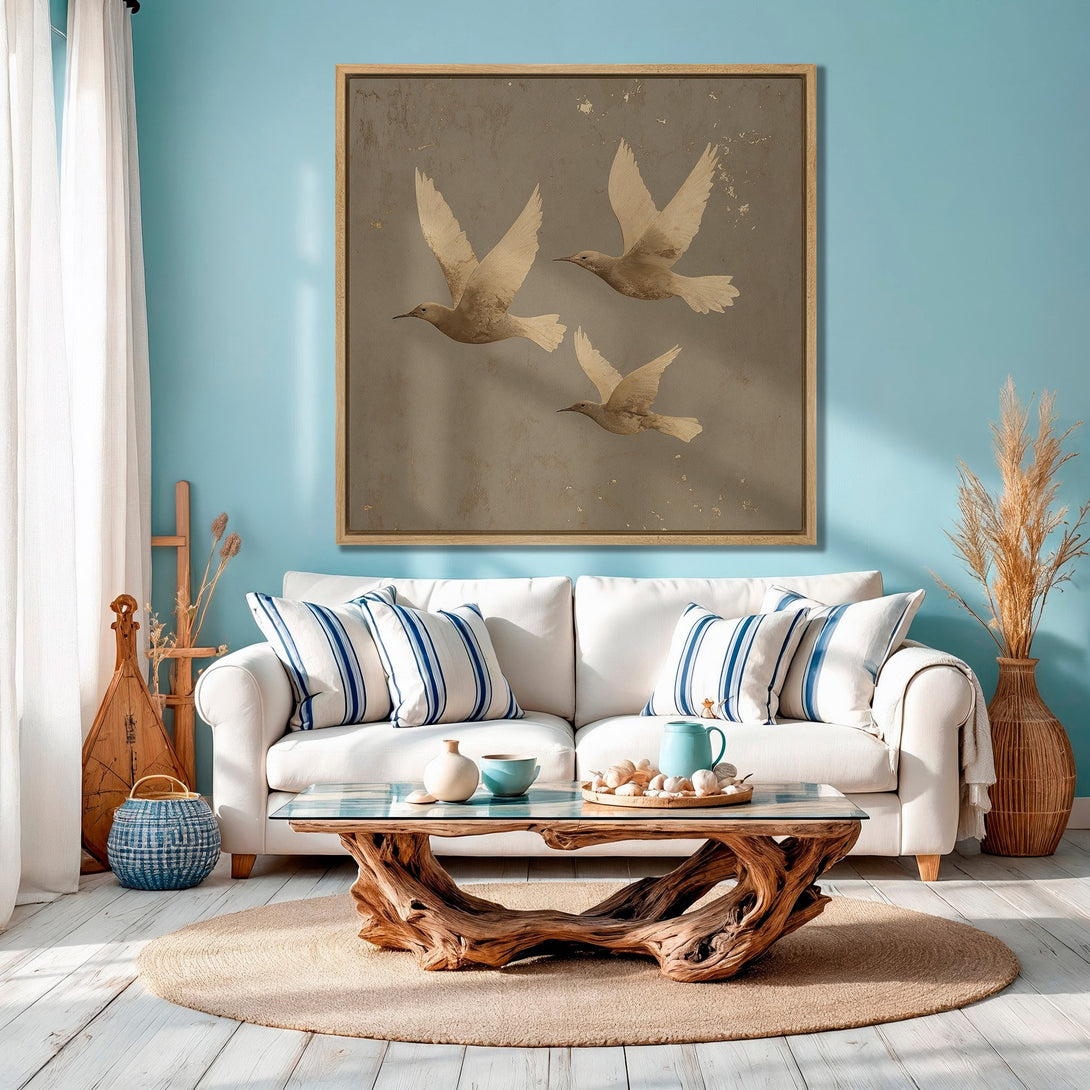 Framed Wall Art featuring elegant bird art. Neutral color palette with pops of blue, perfect for a calming living room. Bring nature indoors!
