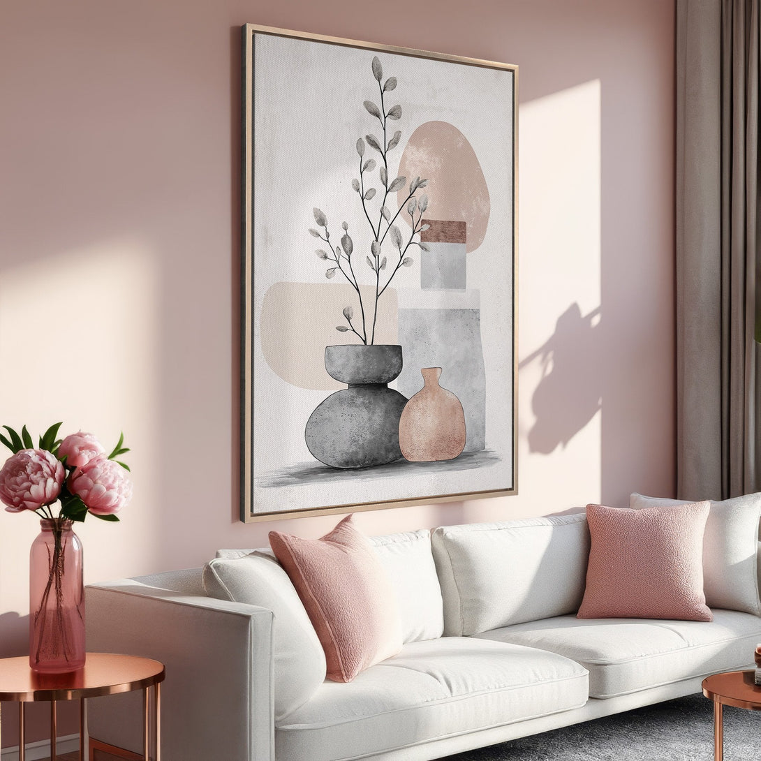 Framed Wall Art featuring an abstract botanical design in a soft, muted pink and gray color palette. Perfect for adding a touch of elegance to your living room!