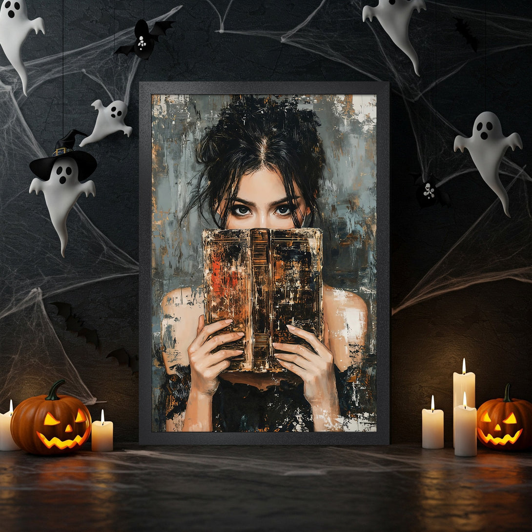 Framed Poster featuring a woman with a book in an abstract style, with a moody gray and gold color palette. Perfect Halloween decor.
