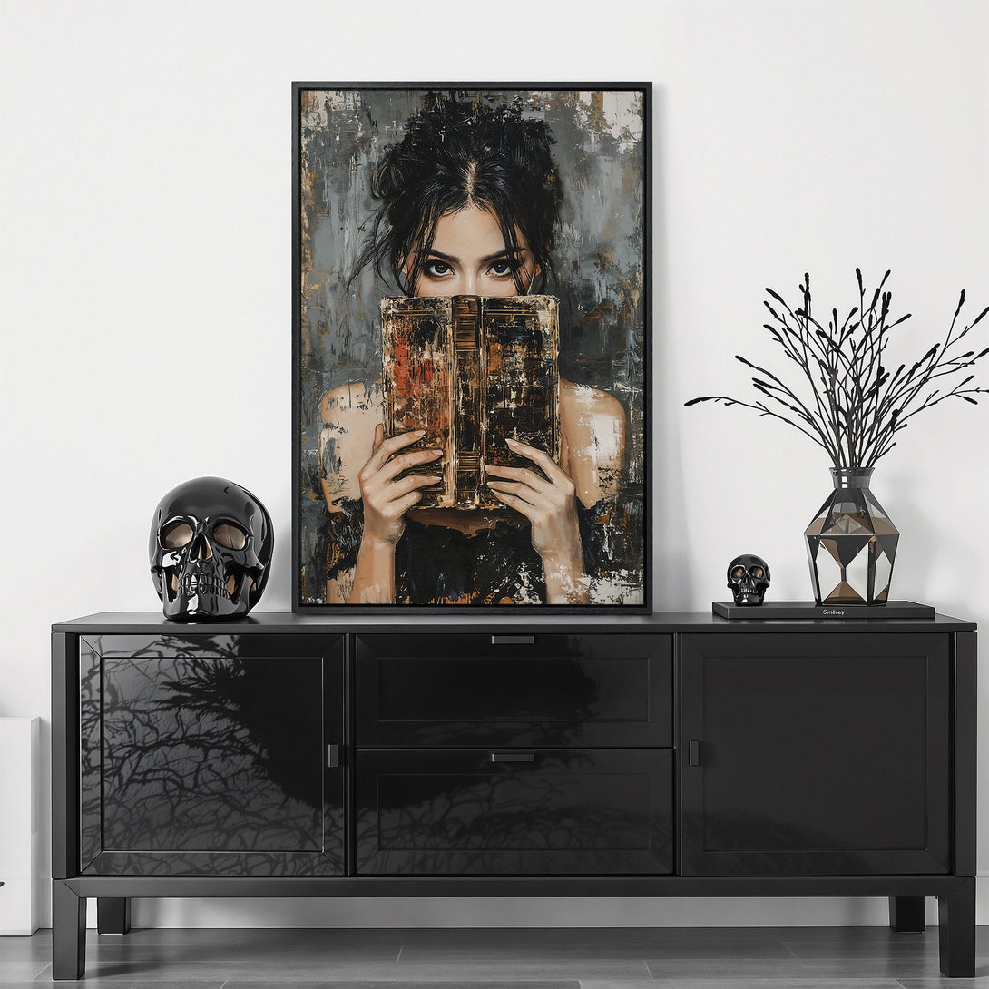 Framed Wall Art featuring a woman with a book, abstract style, neutral color palette. Elevate your space with this captivating Canvas Print!