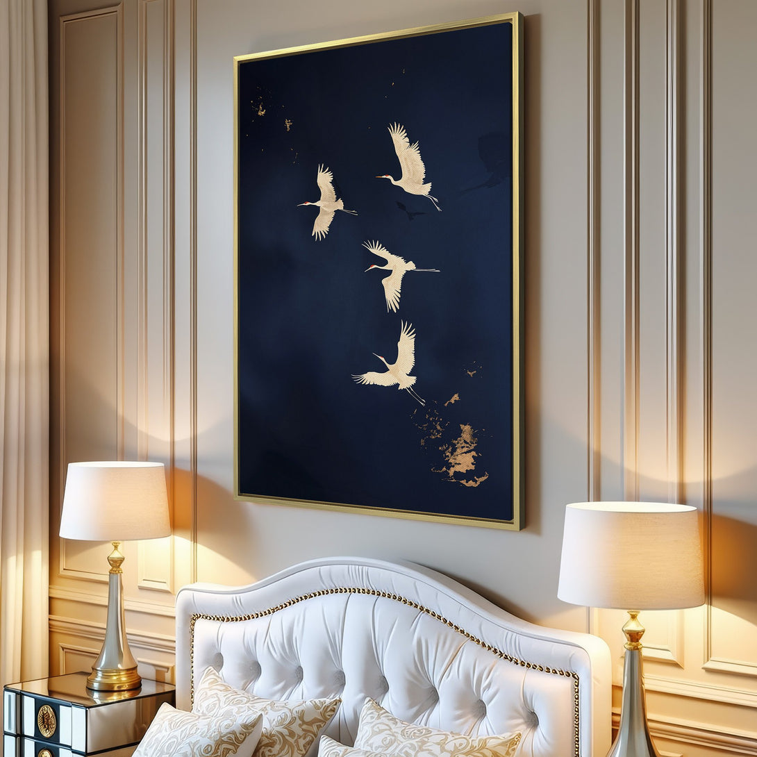 Canvas Print featuring elegant cranes in flight against a deep blue background with gold accents. Modern wall art for a sophisticated interior.