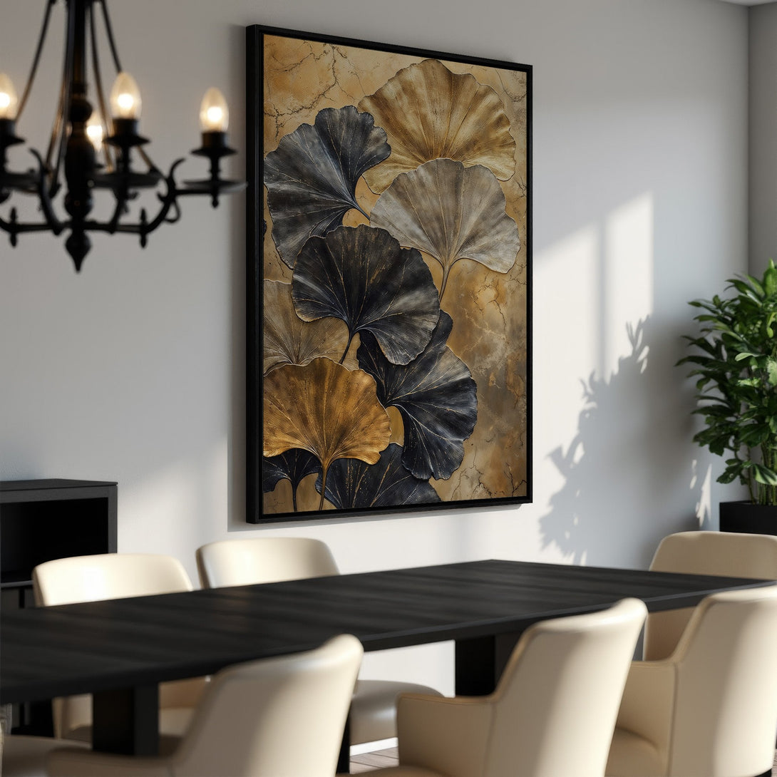 Framed Wall Art featuring elegant gold and black ginkgo leaf design. Modern artwork with a warm neutral color palette, perfect for dining room decor.