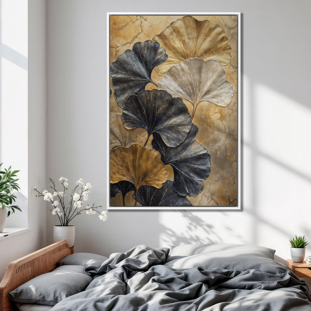Framed Wall Art featuring elegant gold and charcoal leaf design. Modern abstract art with a warm, neutral color palette. Perfect bedroom decor.