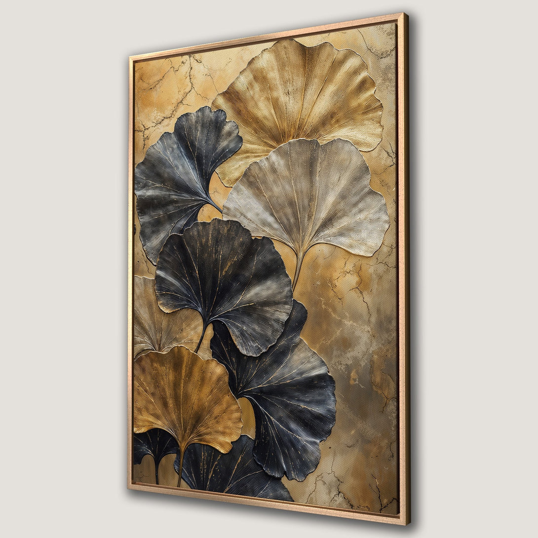 Framed Wall Art featuring abstract ginkgo leaves in gold, black, and neutral tones. Modern art for a stylish home.