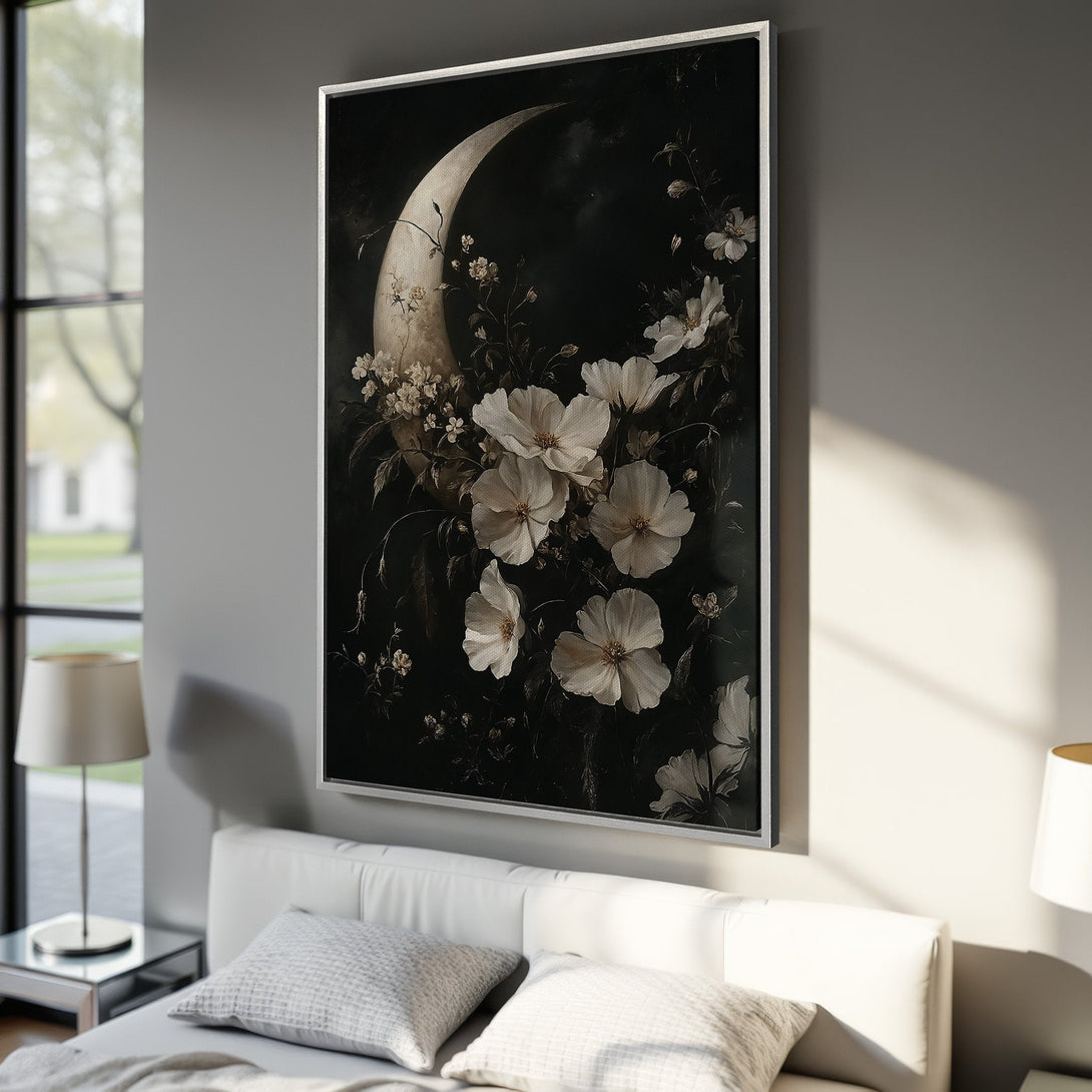 Framed Wall Art: Dramatic floral moon Canvas Print in black, white, and cream tones. Perfect for adding a touch of elegance to your bedroom decor.