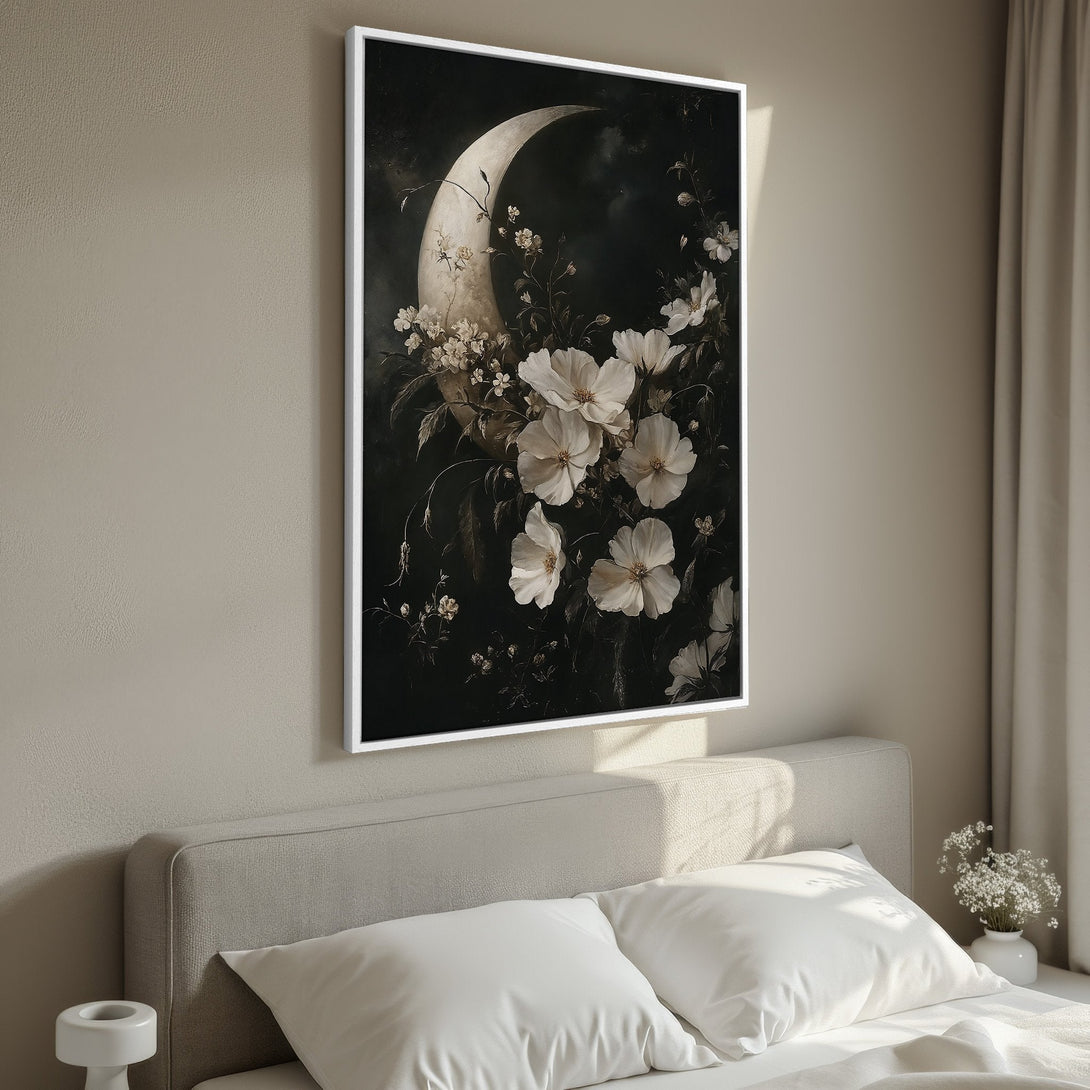 Framed Wall Art featuring a moon and floral design in a dark, moody aesthetic. Elegant canvas print with a neutral, grayscale color palette for sophisticated decor.