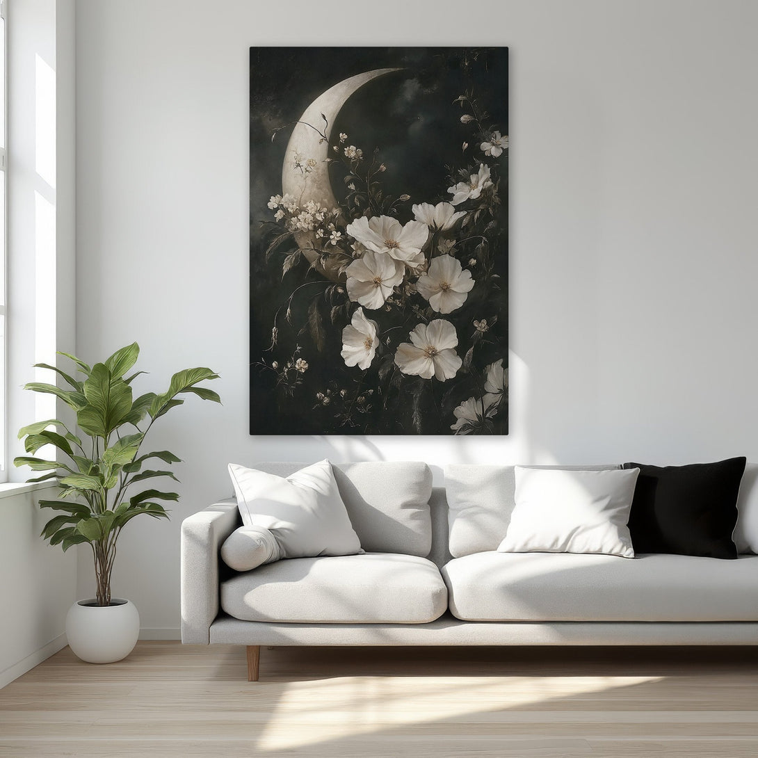 Framed Wall Art: Elegant floral moon art print with a dark, moody aesthetic. Features white flowers against a black background, gold frame. Perfect for bedroom decor.
