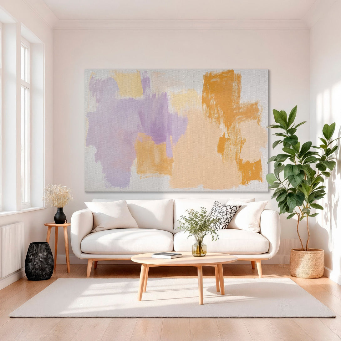 Framed Wall Art: Abstract painting in orange, purple, and peach hues. Modern art canvas print adds a pop of color to a living room.