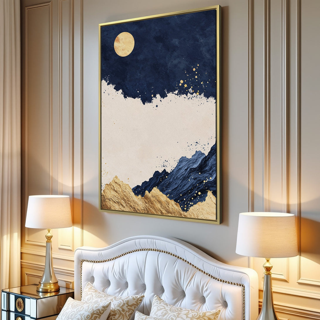 Abstract mountain Canvas Print in a modern living room. Features a navy, gold, and beige color palette. Perfect wall art for a stylish home!