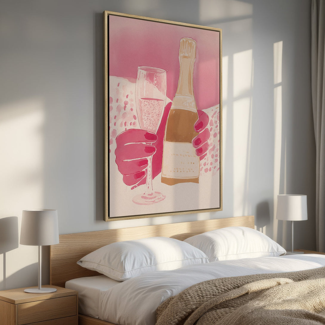 Framed Wall Art featuring a champagne bottle & glass in a pink & gold watercolor style. Perfect for adding a touch of elegance to your bedroom decor.